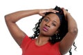 jamaican woman playing with her hair Royalty Free Stock Photo
