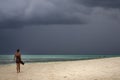 Sexy lady walking along Kendwa beach on Zanzibar