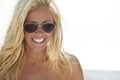 Laughing Blond Girl In Aviator Sunglasses