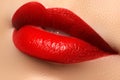 Lips. Beauty Red Lips. Beautiful make-up Closeup. Sensual Mouth. Lipstick and Lipgloss Royalty Free Stock Photo