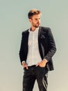 Sexy macho man. male grooming. confident businessman. Handsome man fashion model. success concept. Sky background