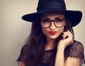 makeup woman in fashion eye glasses and hat with bright red Royalty Free Stock Photo