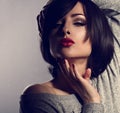 makeup woman with short bob hair style, red lipstick touchi Royalty Free Stock Photo