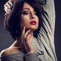 makeup woman with short bob hair style, red lipstick touchi Royalty Free Stock Photo