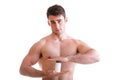 male body builder holding a boxes with supplements on his b Royalty Free Stock Photo