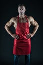 Sexy man cook. man with muscular torso in chef apron. cuisine. male housewife. husband in kitchen. brutal butcher. food Royalty Free Stock Photo