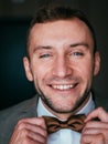 man in tuxedo and bow tie posing Royalty Free Stock Photo