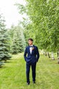 man in tuxedo and bow tie posing Royalty Free Stock Photo