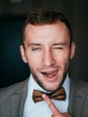 man in tuxedo and bow tie posing Royalty Free Stock Photo