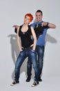 man and woman doing a fashion photo shoot in a professional studio Royalty Free Stock Photo