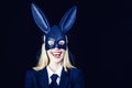 Sexy model dressed in costume Easter bunny. Pretty bunny girl winking and tongue out. Easter woman with sexy bunny Royalty Free Stock Photo