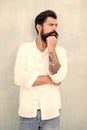 sexy model posing. bearded man wear white shirt. male casual fashion. summer collection. thoughtful male model in white Royalty Free Stock Photo