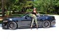 model in sport car beautiful girl with a Ford mustang Roush stage 3 900 HP horse power muscle car. Royalty Free Stock Photo