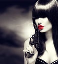 model woman with a gun Royalty Free Stock Photo
