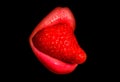 Sexy mouth lips with strawberry tongue, isolated on black.