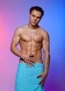 Muscular Man Wrapped in a Towel Royalty Free Stock Photo