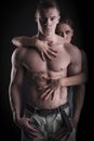muscular naked man and female hands Royalty Free Stock Photo