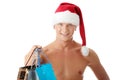 muscular shirtless man in Santa Claus hat Royalty Free Stock Photo