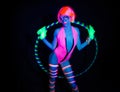 neon uv glow dancer with hulahoop Royalty Free Stock Photo