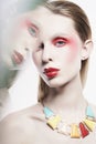 nude lady in colorful neacklace and artistic makeup Royalty Free Stock Photo