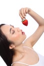 oriental girl eating red strawberry fruit Royalty Free Stock Photo