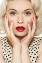 pin-up girl with retro make-up, red manicure Royalty Free Stock Photo