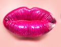 Sexy pink lips. Hot lipstick cosmetics. Full lips on woman face. Luxury icon. Beautiful girl close up. Hyaluronic acid Royalty Free Stock Photo