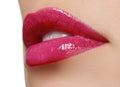 pink wet lip makeup. Close-up of beautiful full lips Royalty Free Stock Photo