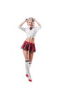 sexy playful woman in short schoolgirl plaid skirt and knee socks with eyeglasses posing