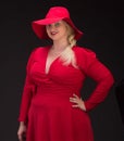 plus size woman in red hat with red lips. Royalty Free Stock Photo