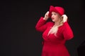 plus size woman in red hat with red lips. Royalty Free Stock Photo