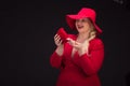 plus size woman in red hat with red lips. Royalty Free Stock Photo