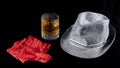 Sexy red lace panties, gray man`s hat and glass of whiskey Royalty Free Stock Photo