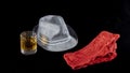 Sexy red lace panties, gray man`s hat and glass of whiskey Royalty Free Stock Photo