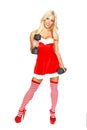 santa woman with dumbbells Royalty Free Stock Photo