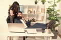 Sexy secretary personal assistant. Typical office life. Man bearded hipster boss sit in leather armchair office interior Royalty Free Stock Photo