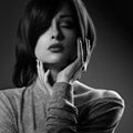 sensual woman with short bob hair style with closed eyes, r