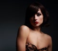 short hair woman with bright makeup on dark background Royalty Free Stock Photo