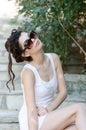 slim lady wear tight short white dress and sunglasses Royalty Free Stock Photo