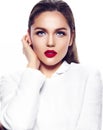 stylish fashion model in white coat with red lips