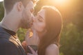 Sexy summer couple. Close-up of young romantic lovers is kissing. Profile of beautiful people in love expressing and Royalty Free Stock Photo