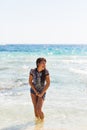 summer outdoor style beach sea vacation portrait of hot tanned beautiful sporty girl in tunic Royalty Free Stock Photo