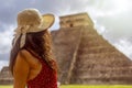 Sexy tourist under the tropical sun enjoying and visiting the pyramid of Chichen Itza in the Yucatan Peninsula