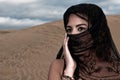 woman belly dancer arabian in desert dunes Royalty Free Stock Photo