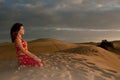 woman belly dancer arabian in desert dunes Royalty Free Stock Photo