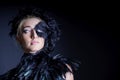 woman with black feather half mask Royalty Free Stock Photo