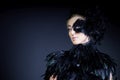 woman with black feather half mask Royalty Free Stock Photo