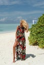 woman with blond hair in elegant swimming suit relaxing on Royalty Free Stock Photo