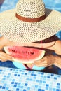woman with dark hair eating watermelon Royalty Free Stock Photo