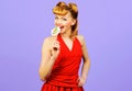 Sexy woman eating lollipop. Beautiful girl with fashion hairstyle eat Sweet candy. Royalty Free Stock Photo